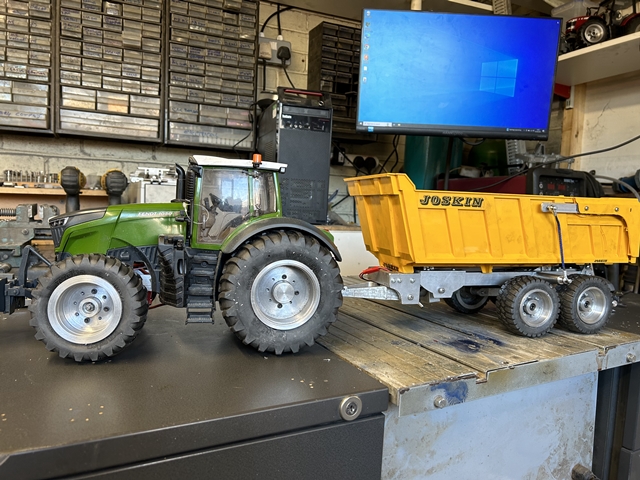 one of ou latest tractors with a joskin tipping trailor